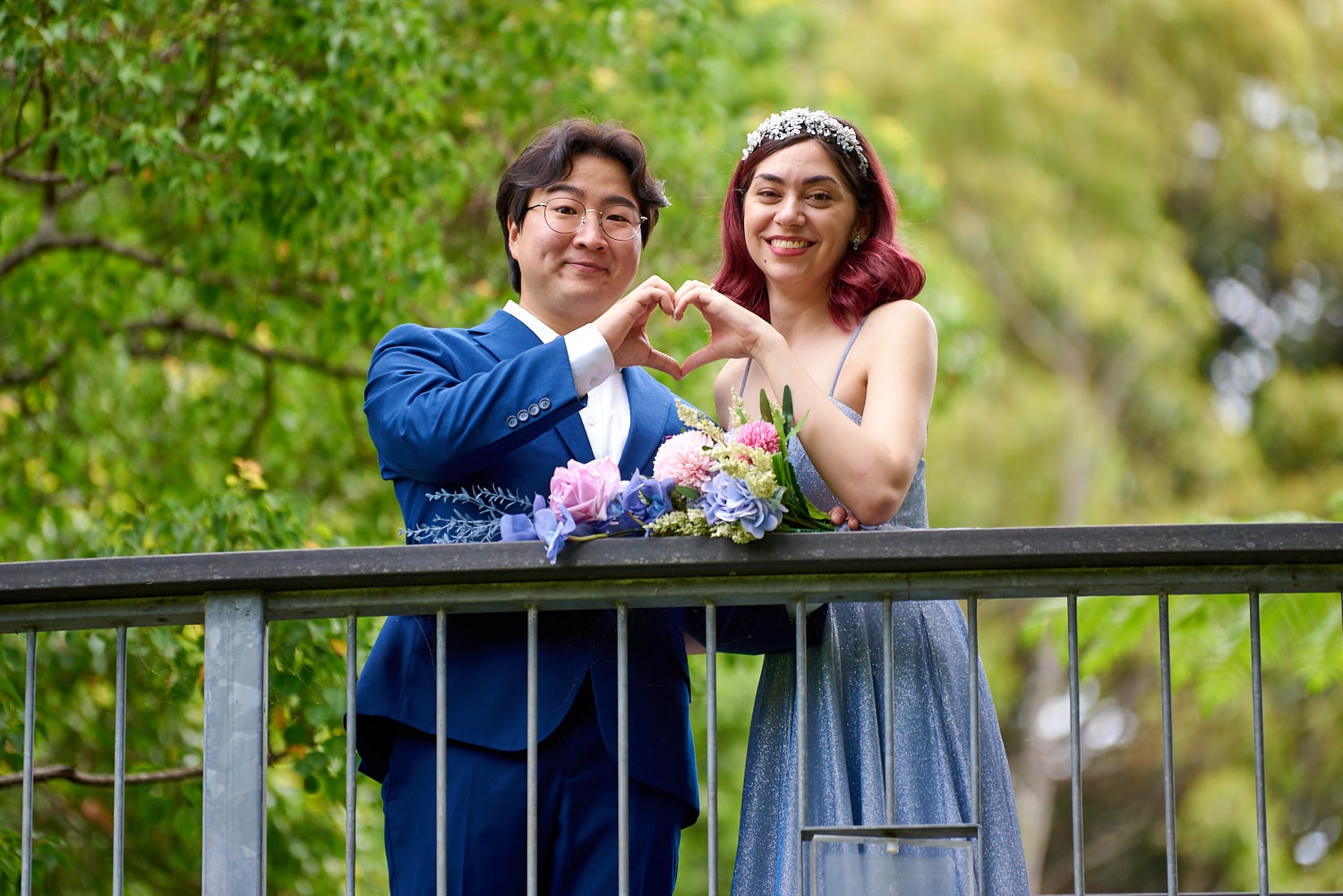 Small Park Wedding in Muston Park Chatswood Sydney. Couple, hand love heart shape symbol. Photo by orlandosydney.com