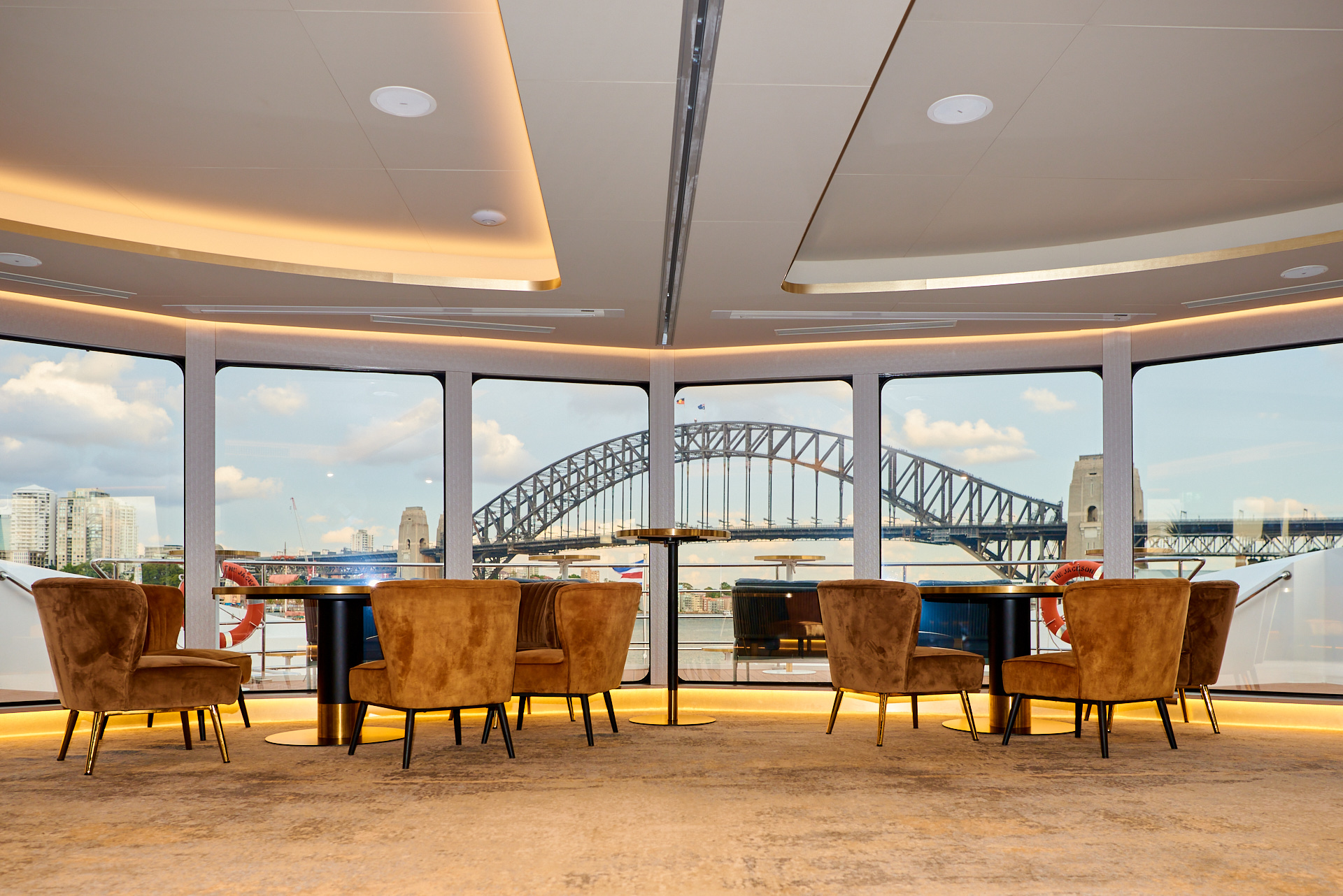 The Jackson, Boat Interior Photo, View of Sydney Harbour Bridge in background. Corporate Event Photography by orlandosydney.com
