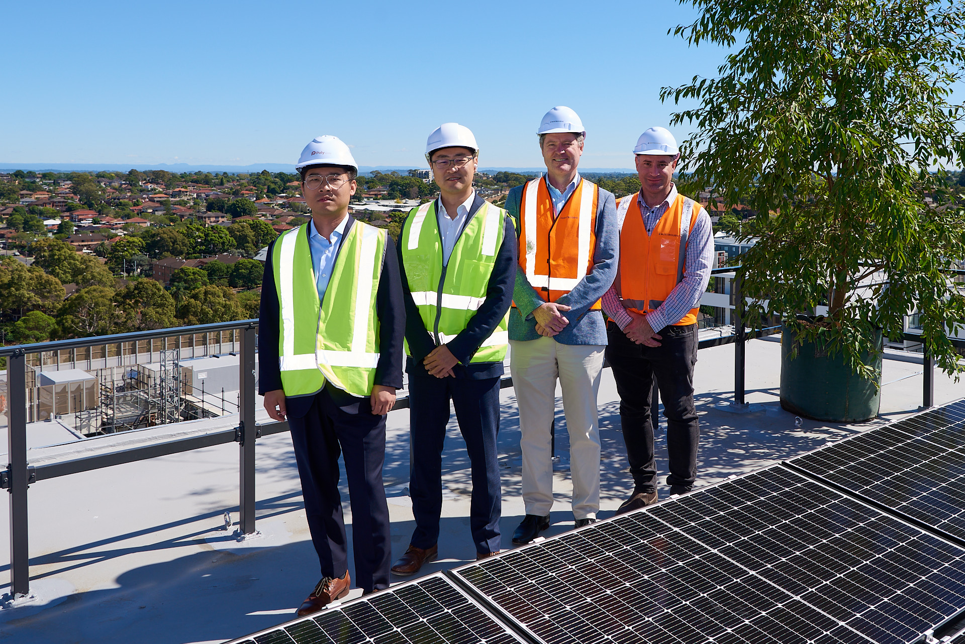 Topping Out Ceremony, Standing on the rooftop at a project. Photographers in Sydney.
