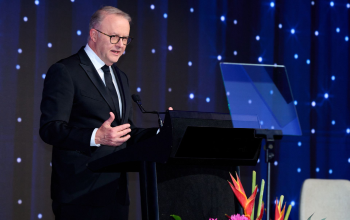 Best Corporate Event Photography Sydney, Australia. Photo of Anthony Albanese Prime Minister of Australia at Podium Lectern giving Speech