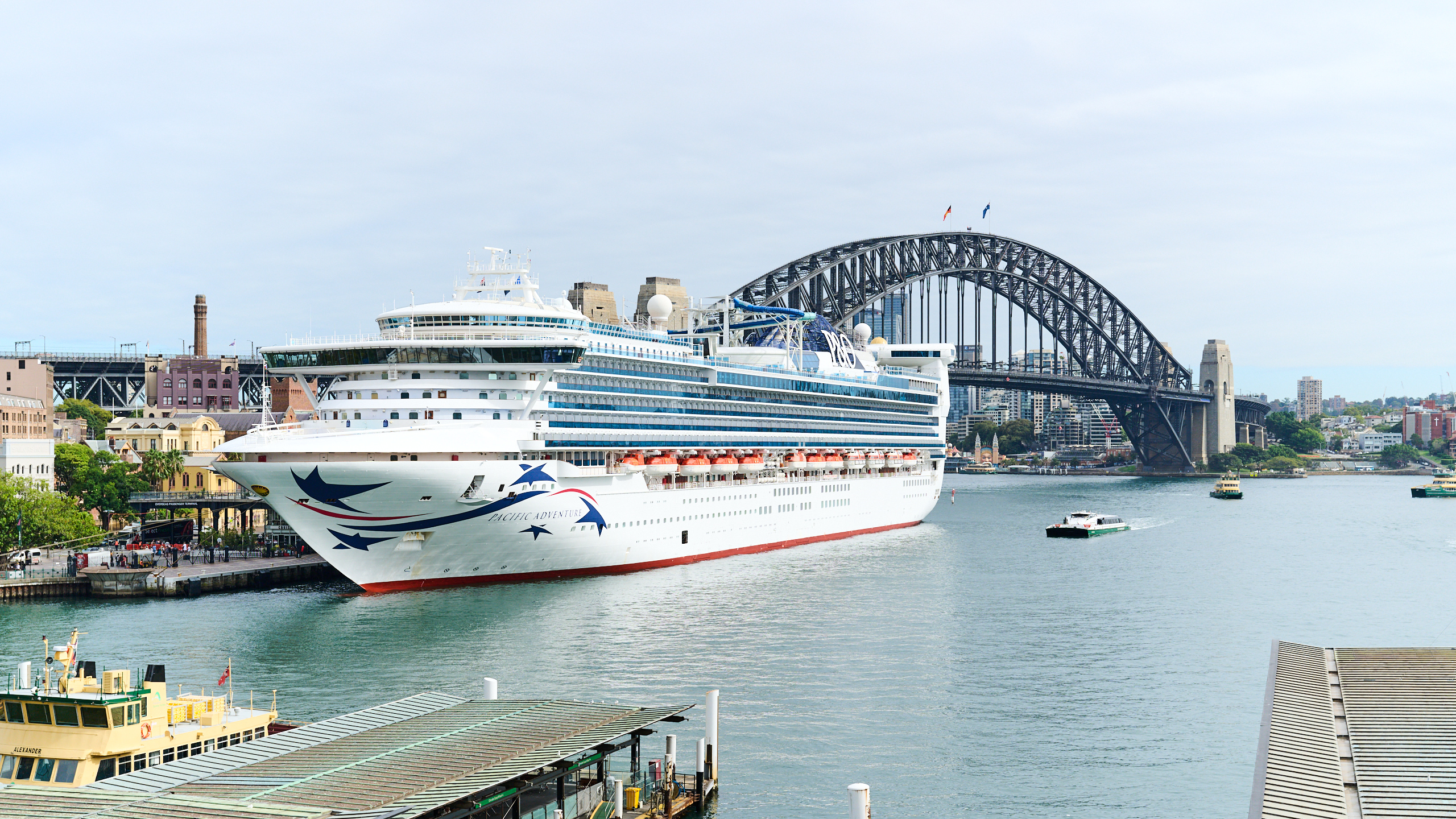 Sydney Harbour from Circular Quay Photo with P&O Ship in the foreground, Harbour Bridge in the Background by orlandosydney.com